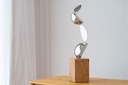 ESCULTURA MOVIMIENTO. ACERO Y MÁRMOL