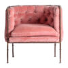 Sillón capitoné tardiano de estilo shabby chic fabricado en hierro en color rosa combinado con terciopelo y algodón.