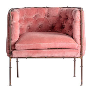 Sillón capitoné tardiano de estilo shabby chic fabricado en hierro en color rosa combinado con terciopelo y algodón.