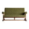 Sofá Creusot de estilo colonial fabricado en madera de pino reciclado en color marrón combinado con poliéster en color verde.