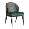 Silla Kelheim de estilo art deco fabricado en madera de caucho en color verde combinado con espuma y terciopelo.