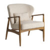 Sillón Tarres de estilo contemporáneo fabricado en poliéster en color beige combinado con madera de fresno en color marrón y espuma.